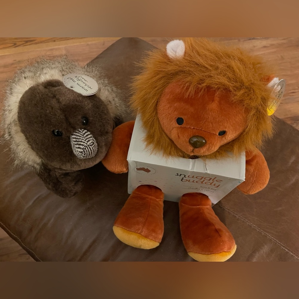 Two Snuggle Buddy /NWT/ never used. Lion and Wombat